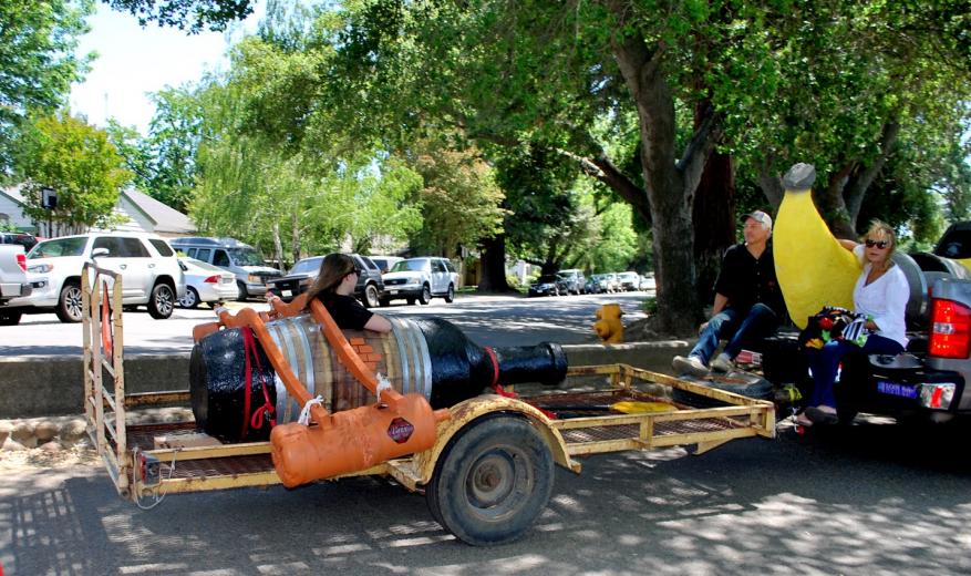 Local wineries spent several weeks ahead of the festival crafting “boats” from wine barrels, set to race across the lake. Macchia Winery won the regatta for the second year in a row, cleverly designing their boat as a streamlined fluorescent banana Local wineries spent several weeks ahead of the festival crafting “boats” from wine barrels, set to race across the lake. Macchia Winery won the regatta for the second year in a row, cleverly designing their boat as a streamlined fluorescent banana