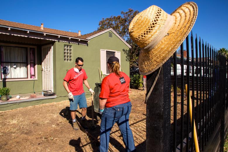 The Wells Fargo volunteer team begins to landscape the front yard for a home on El Cerrito Way. It was one of 10 home improvement projects completed in a single day as part of Paint the Town. The Wells Fargo volunteer team begins to landscape the front yard for a home on El Cerrito Way. It was one of 10 home improvement projects completed in a single day as part of Paint the Town.
