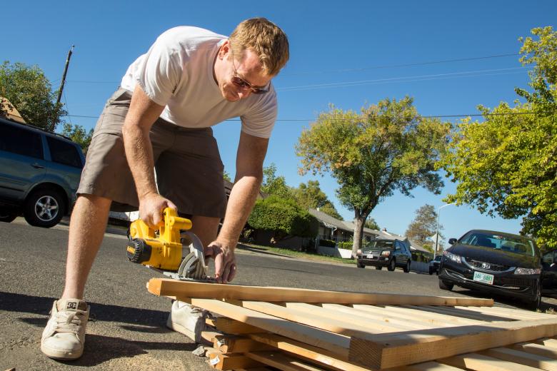 Derek Ulmer and the volunteer team from the University of the Pacific McGeorge School of Law construct a new picket fence during Paint the Town. Derek Ulmer and the volunteer team from the University of the Pacific McGeorge School of Law construct a new picket fence during Paint the Town.