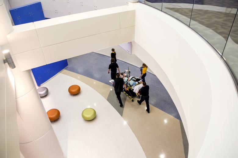 A high-risk maternity patient is taken through the lobby of the new Anderson Lucchetti Women's and Children's Center at Sutter Medical Center, Sacramento. All patients were transported by ambulance, with a registered nurse attending, as Sutter Memorial Hospital ceased operations on Saturday, August 8, 2015. A high-risk maternity patient is taken through the lobby of the new Anderson Lucchetti Women's and Children's Center at Sutter Medical Center, Sacramento. All patients were transported by ambulance, with a registered nurse attending, as Sutter Memorial Hospital ceased operations on Saturday, August 8, 2015.