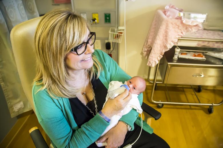 Wendy Bradley feeds her 16-day-old daughter Carly – one of three triplets born July 23 – in the neonatal intensive care unit at the new Anderson Lucchetti Women's and Children's Center at Sutter Medical Center, Sacramento. Wendy Bradley feeds her 16-day-old daughter Carly – one of three triplets born July 23 – in the neonatal intensive care unit at the new Anderson Lucchetti Women's and Children's Center at Sutter Medical Center, Sacramento.