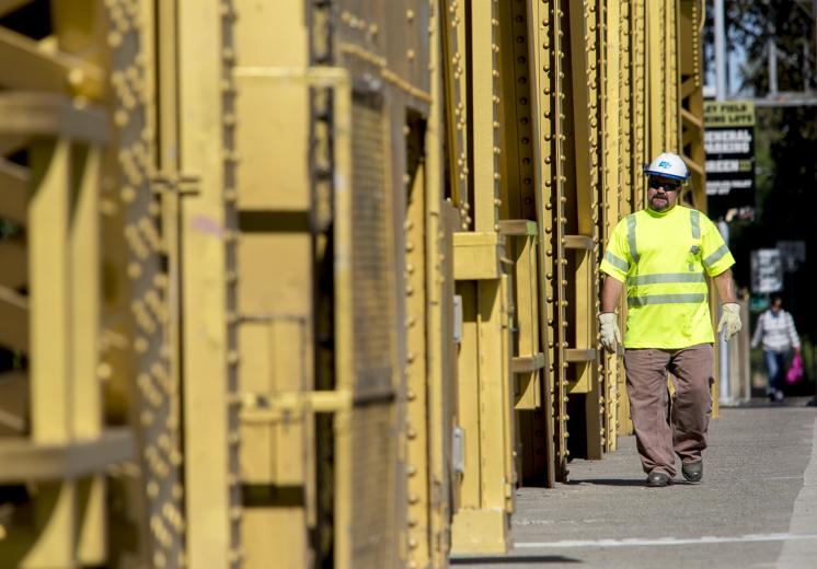 Bennett does visual checks daily and greases the bridge’s gears every 40 to 70 openings. But with the drought lowering water levels (and therefore increasing clearance under the bridge) and fewer shipments traveling upriver as a result of rising fuel prices and a soft economy, these days most maintenance is done to exercise the gears and keep the cables from stiffening. “In the last three years we’ve gone from like 160 openings a month to just a few,” Bennett says.
Bennett does visual checks daily and greases the bridge’s gears every 40 to 70 openings. But with the drought lowering water levels (and therefore increasing clearance under the bridge) and fewer shipments traveling upriver as a result of rising fuel prices and a soft economy, these days most maintenance is done to exercise the gears and keep the cables from stiffening. “In the last three years we’ve gone from like 160 openings a month to just a few,” Bennett says.