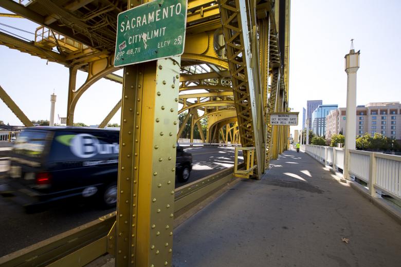 According to Keaton, the bridge is about 730 feet in length from one bank to the other. "This is actually State Highway 275, the shortest highway in the state of California," he says. The bridge towers are 160 feet tall. According to Keaton, the bridge is about 730 feet in length from one bank to the other. "This is actually State Highway 275, the shortest highway in the state of California," he says. The bridge towers are 160 feet tall.