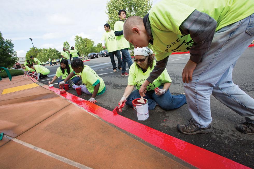 5000 ReIMAGINE Mack Road volunteers paint fire curbs and refresh landscaping at one of 26 project sites within the commercial corridor on Mack Road. 

(Photo: Gerry McIntyre)