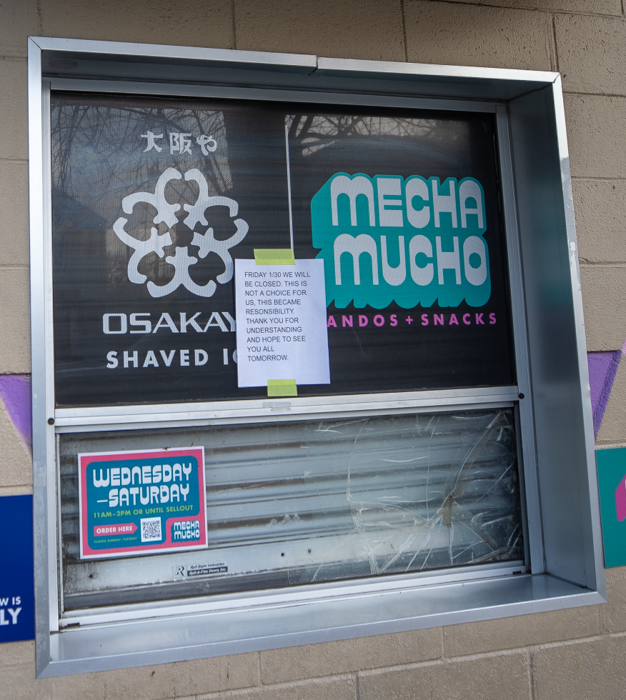A sign on the take-out window at Mecha Mucho and Osaka-Ya Shaved Ice on 10th Street in Sacramento shows their support for the Jan. 30 protest where several businesses in the Sacramento area participated.