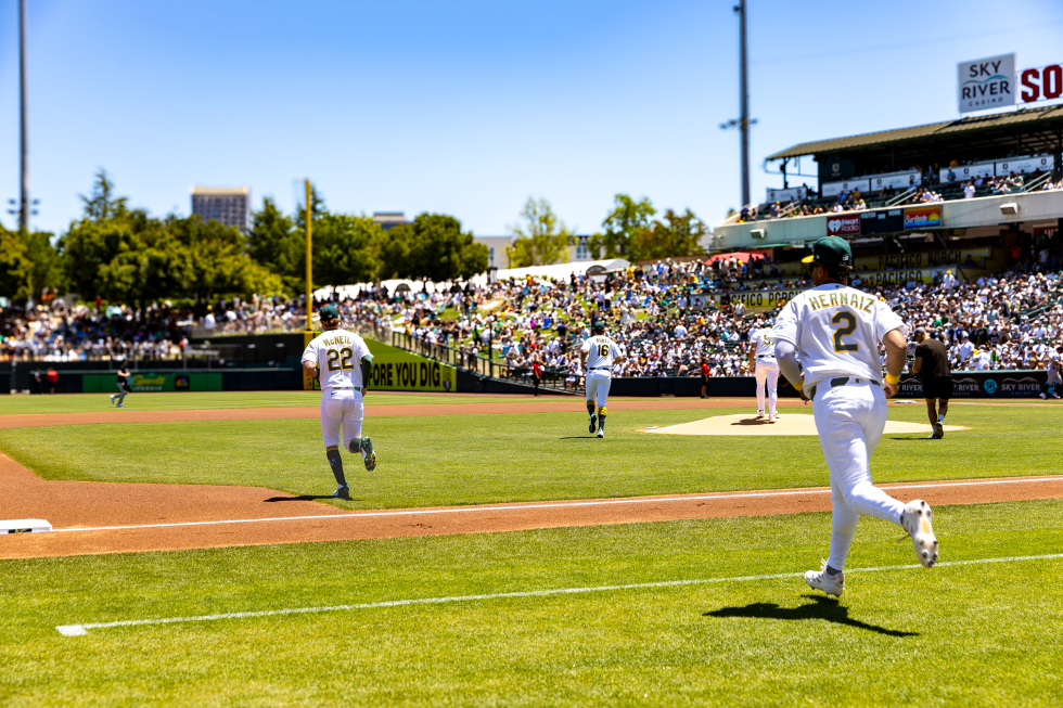 Athletics players take the field before the sold out May 31 game at Sutter Health Park against the New York Yankees. (Photo by Steve Martarano)