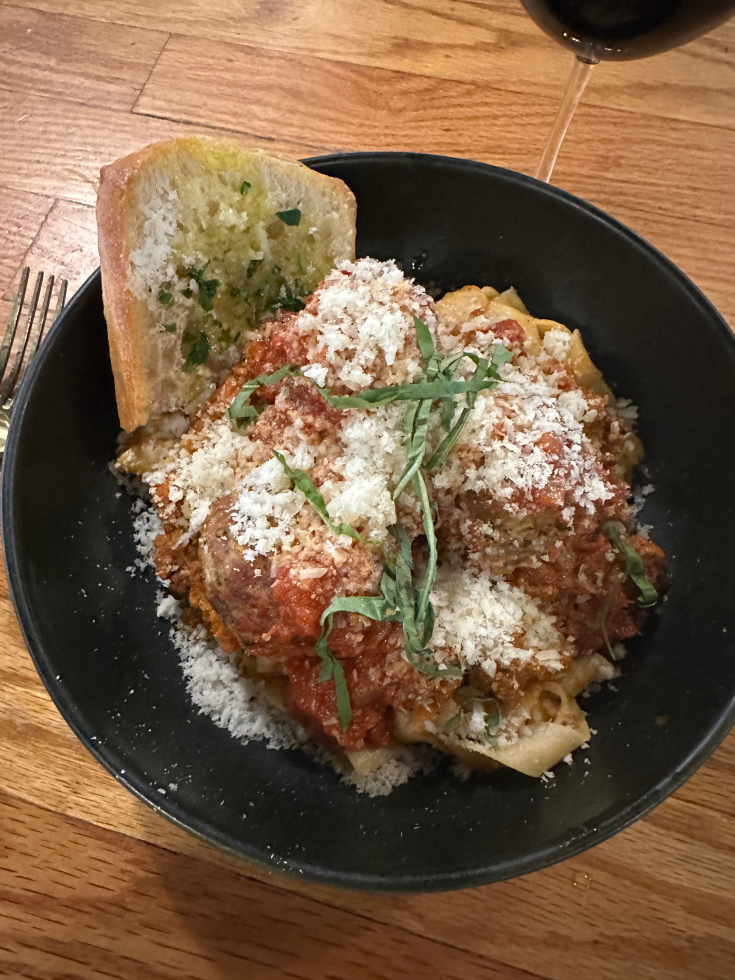 Though an Italian might disagree, the Seat at the Bar Diner likes pasta bolognese with a side of meatballs.