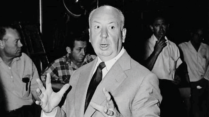 Alfred Hitchcock on the set of his television program, "Alfred Hitchcock Presents," in 1955. (Public domain image via Wikimedia Commons)