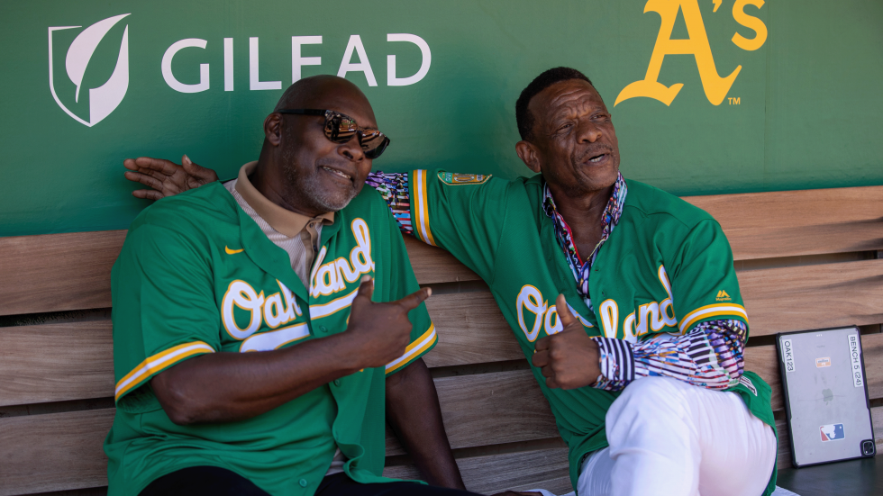 Two of the A’s favorite players over the years, Dave Stewart and Rickey Henderson, inside the A’s dugout before the final game at the Coliseum on Sept. 26. The pair threw out the first pitch together.