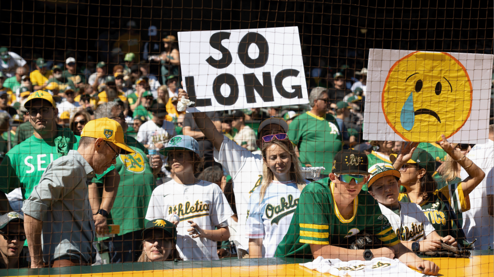 A’s fans lament the team’s departure at the team’s last game at the Oakland Coliseum on Sept. 26.