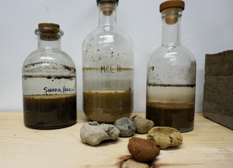 Soil samples sit on a shelf in Connelly’s studio at Verge Center for the Arts. (Photo by Marie-Elena Schembri)