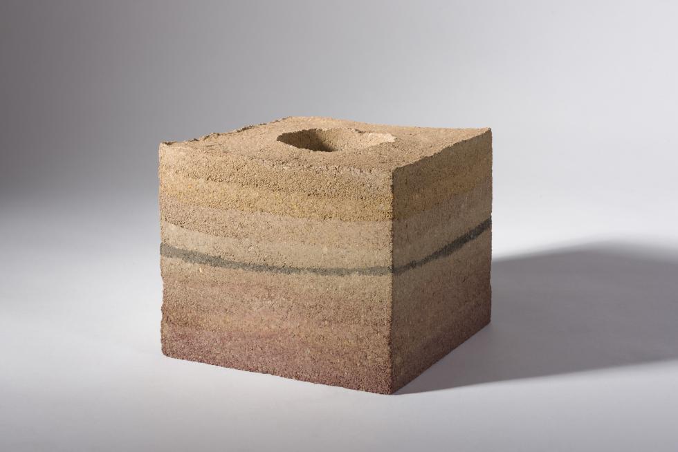 Connelly’s current research project, funded by the City of Sacramento’s Office of Arts and Culture 2023 Seeding Creativity Grant, involves researching rammed earth, an eco-friendly and low-cost building material that is created by ramming a mixture of gravel, sand, soil and fine cement into a densely packed form. (Photo courtesy of Muzi Rowe)