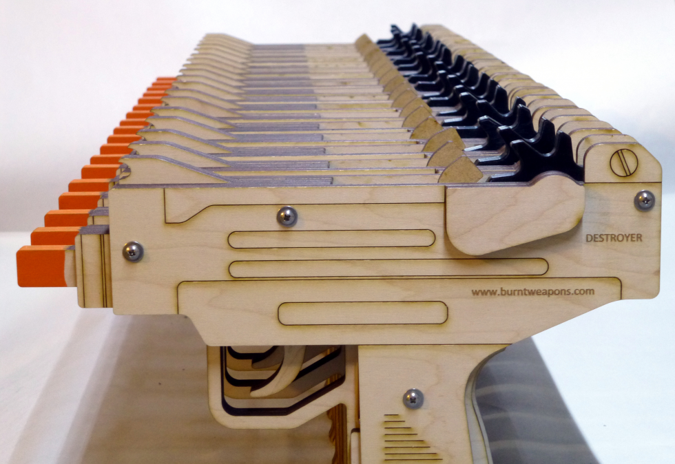 Fulenwider’s first Kickstarter campaign, in which backers received rubber band-powered toy guns made with laser-cut wood, bought him a laser cutter machine. (Photo courtesy of Thomas Fulenwider)
