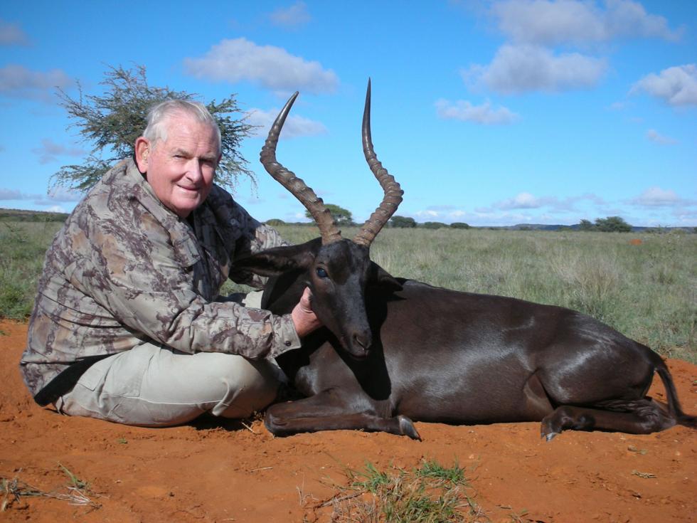 Doug Eberhardt, president of the Bank of Stockton, with a black impala (above) in 2007 and a musk ox in 1990.

(Photos courtesy of Doug Eberhardt)