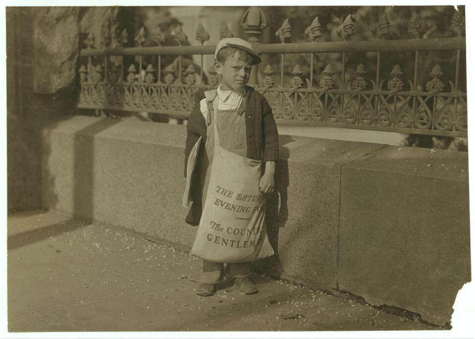 Freddie Kafer, a young newspaper vendor, sells the Saturday Evening Post outside Sacramento's state Capitol in May 1915. The photographer, Lewis Wickes Hines, photographed newspaper boys and other child workers around the country for the National Child Labor Committee. (Public domain via Library of Congress)