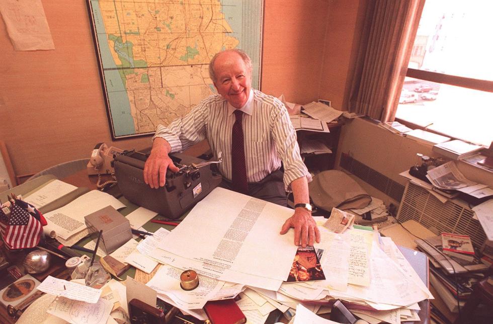 Newspaper columnist Herb Caen in his San Francisco Chronicle office in 1994. (Photo by Nancy Wong via Wikimedia Commons, licensed under CC-BY 4.0)