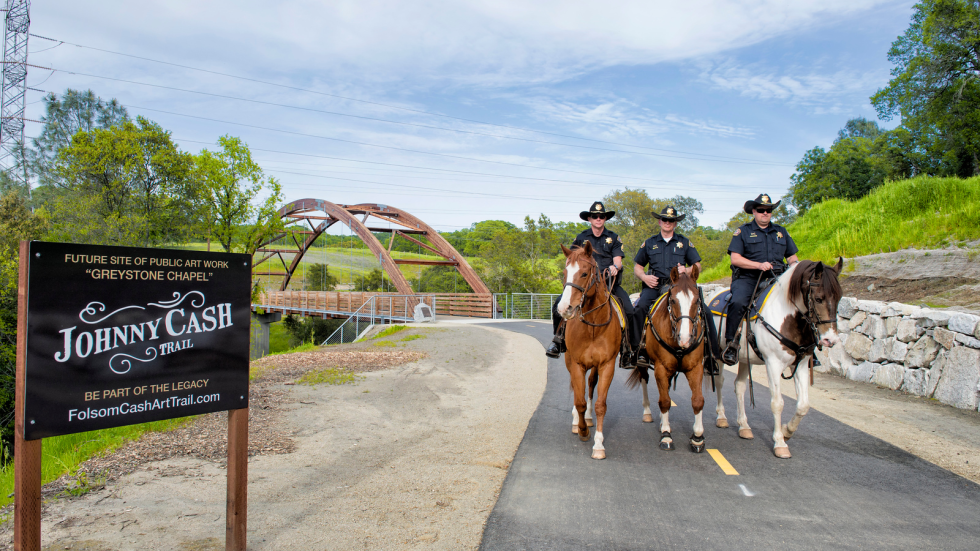 Mounted officers travel the Johnny Cash Trail in Folsom, a 2.5-mile route honoring the musician and his famous 1968 concert at Folsom Prison.