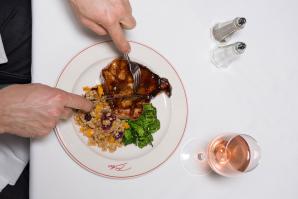 On Biba restaurant’s menu: Grilled Niman Ranch pork porterhouse cut with a balsamic vinegar glaze served with farro, butternut squash and radicchio.