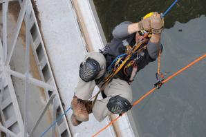 Christopher Abela, a civil engineer with the U.S. Army Corps of Engineers Sacramento District, ascends a climbing rope during an inspection at New Hogan Dam near Valley Springs.

(photo: Courtesy U.S. army corps of engineers)