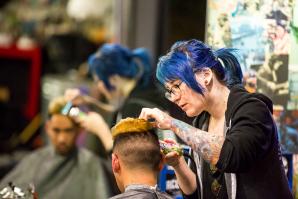 When a new client hears his barber’s name is Renee, he might envision an “old French dude” and not a young woman. The industry remains, after all, a field of men. “When I was in school, it was me and 60 dudes,” says Renee Green, 29 (pictured standing).