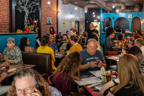 Customers dine at Culinerdy Kitchen during the restaurant’s opening week in June.