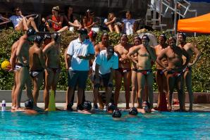 James Graham (white shirt, on right) coaches the men’s water polo team at the University of the Pacific.