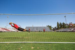 Dominik Jakubek, one of two goalkeepers for Sacramento Republic FC, makes a diving save on a shot during practice at Bonney Field. Jakubek joined the franchise as an original member in 2014. He was 34 years old when he was signed. 