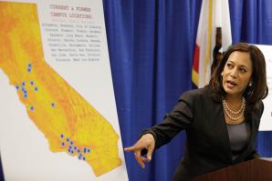 California Attorney General Kamala Harris points during a news conference to a display showing the location of Corinthian Colleges in California. 

(photo by © Eric Risberg/ /AP/Corbis)
