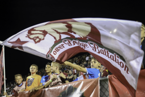 A young fan waves a Tower Bridge Battalion flag during the Aug. 16 match against rival Oakland Roots at Sutter Health Park. (Photos by Steve Martarano)