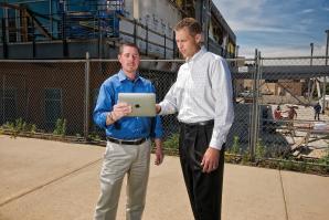 Chrid Ross, CEO of Construction Connect Inc., with company president and COO, Marcus Linden 