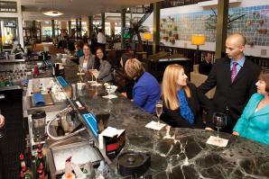 Although vacancies at the Sheraton Grand have increased the past few years, the lobby's bar has maintained business. 