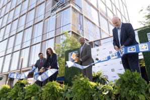Cutting the ribbon for the new Aggie Square are, from left to right, Sacramento Mayor Pro Tem Eric Guerra; Claire Drummond, Vice President for Development, Wexford Science & Technology; UC Davis Chancellor Gary S. May; and UC Davis Chief Innovation and Economic Development Officer George Baxter. (Photo courtesy of UC Davis)