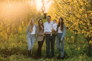 The three Taylor sisters with their father, from left to right, Elaine, Jacqueline, Richard and Allison. (Photo by Matt Morris)