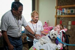 Heather Phillips has been in the hospital for nearly five years. She is visited regularly by Sherm and Sandy Waldman and their West Highland white terrier as a part of a palliative care program at Sutter Roseville Medical Center.  