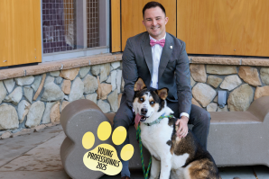 Freddie Silveria is owner of FSA Auctions. Look at those blue eyes on this happy dog named Baklava! (Photo by Fred Greaves, expanded with Adobe)