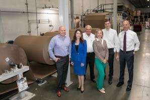 With custom manufacturing equipment (from left to right):
Matt Sewell, president, Sunrise Manufacturing;
Erica Fernandez, senior vice president, American River Bank; Jim Sewell, founder, Sunrise Manufacturing;
Lynn Reid, client services manager, Gold River Branch;
Paul Turner, CFO, Sunrise Manufacturing;
David Taber, president/CEO, American River Bank.