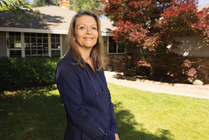 Leanne Visser lost her homeowners insurance because some branches were hanging over the roof of her Arden-Arcade home, which isn’t in a fire zone. (Photo by Katy Karns)