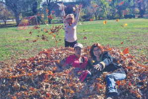 Comstock's Editor Judy Farah enjoys a New Jersey leaf pile with two longtime friends.