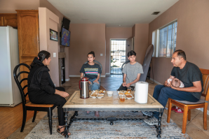 Said Asadullah Sadaat and his family of 12 settled into a rental home in Elk Grove after they fled Afghanistan in 2021. His wife, Malika, daughter Saghar, son Elham and Sadaat with his infant daughter Elhan.